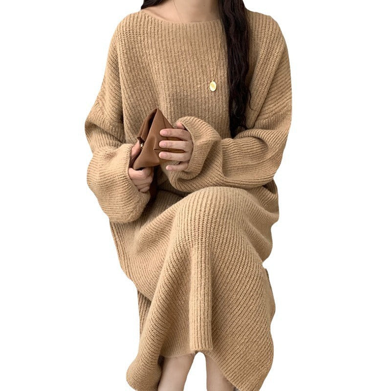 A Knee-length Knitted Sweater Dress Creates A Refined And Elegant Look For The Modern Woman